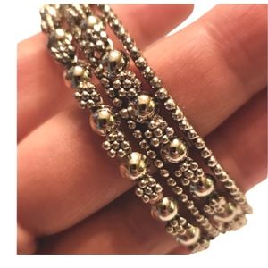 4 beaded textured bangles silvertoned floral artisan